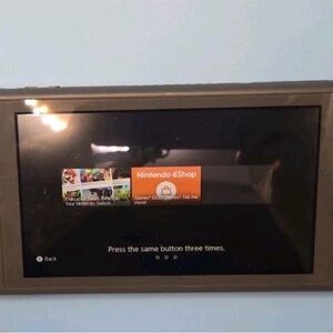 Nintendo Switch Console with Gray Housing and Black Screen